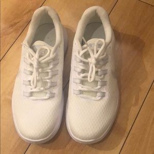 Brand new white Nike shoes